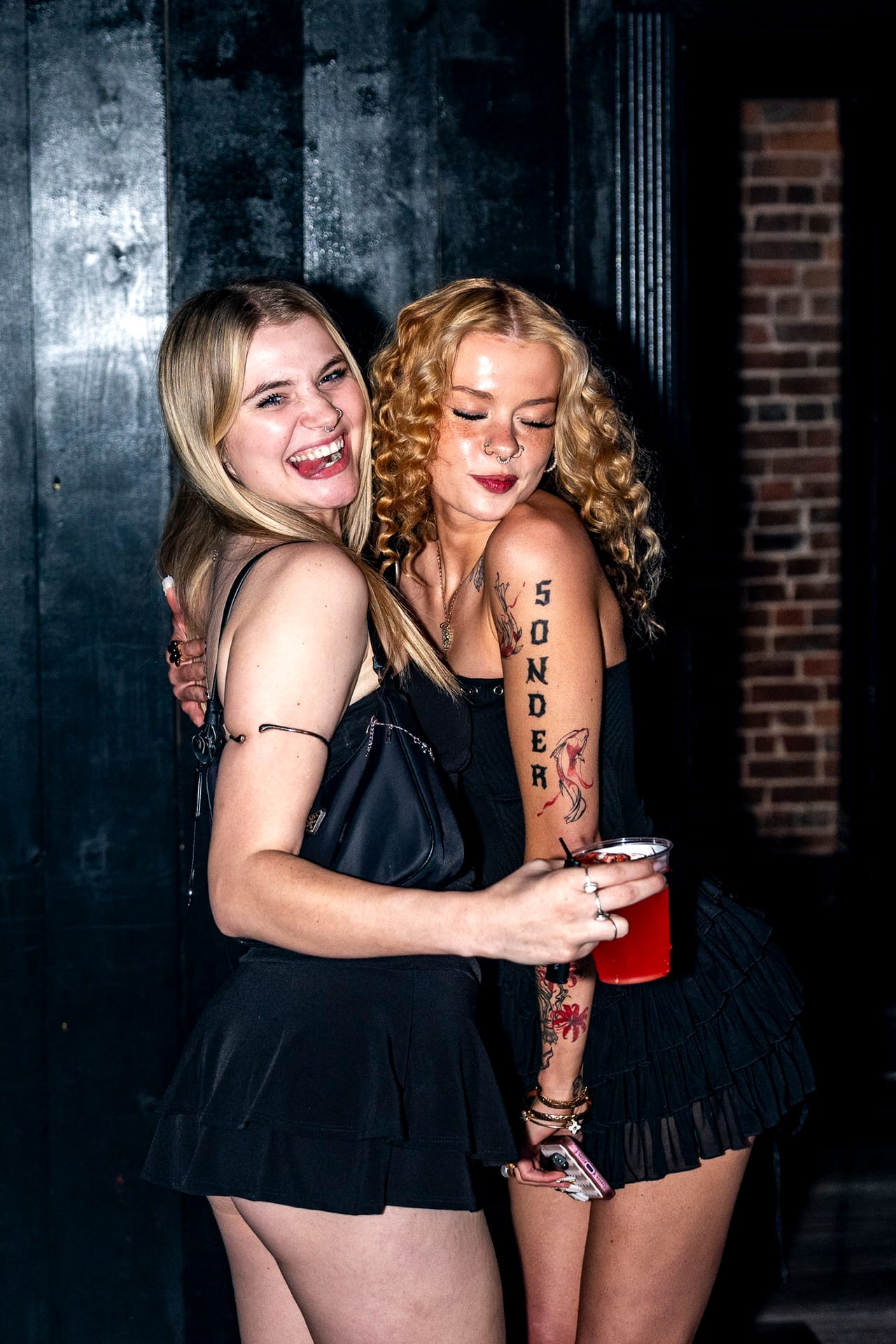 Two guests laughing during a night at CTRL in Springfield, Missouri.